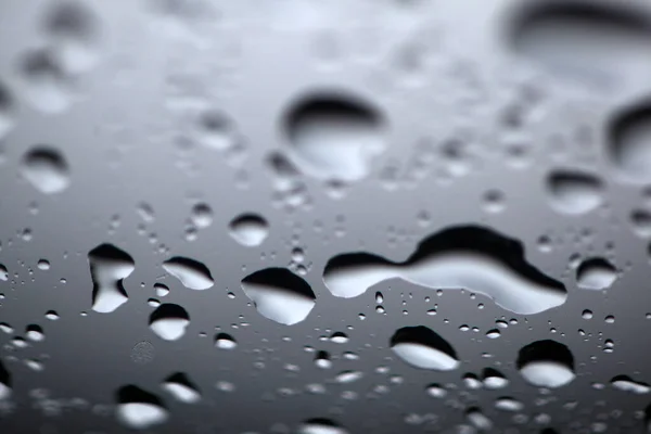 Rain drops on windows glass. Close-up of water droplets on glass, Rain Rain, Go Away