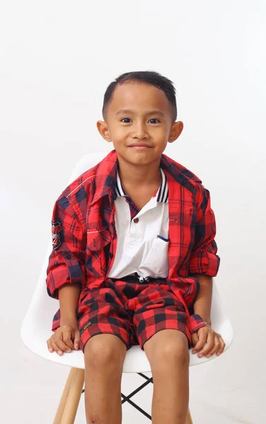 Happy Asian Boy Red Sitting White Background — Stok Foto