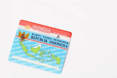 Yogyakarta, Indonesia - Mar 10, 2021 : Surat Ijin Mengemudi (SIM) or driver licenses and Kartu Tanda Penduduk (KTP) or Indonesian Identity Card