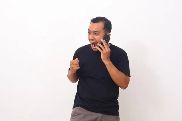 Asian Young Man Looks Mad While Phone Call Isolated White — Stock Photo, Image