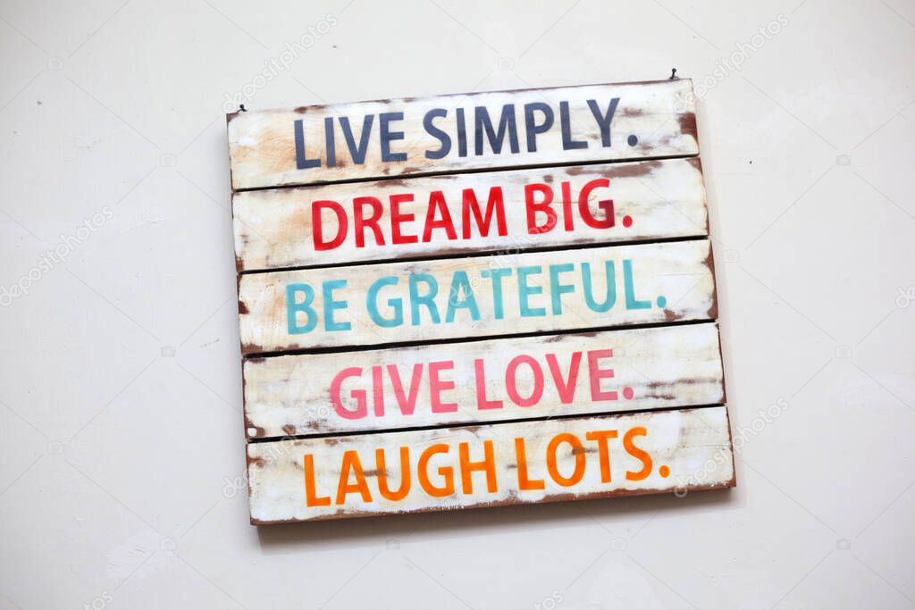 Live Simply, Dream Big, Be Grateful, Give Love, Laugh Lots. Motivational words