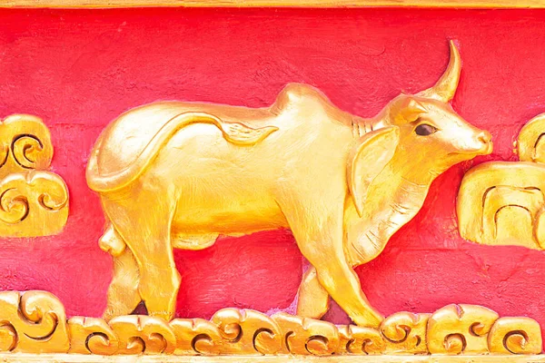 Stock image Golden stucco bulls adorn the walls