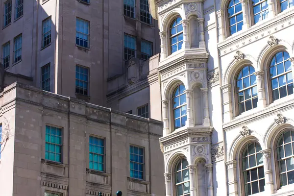 Sunshuny windows of old architectural buldings — Stock Photo, Image