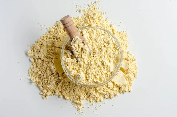 Gram flour made of chickpeas on white background — ストック写真