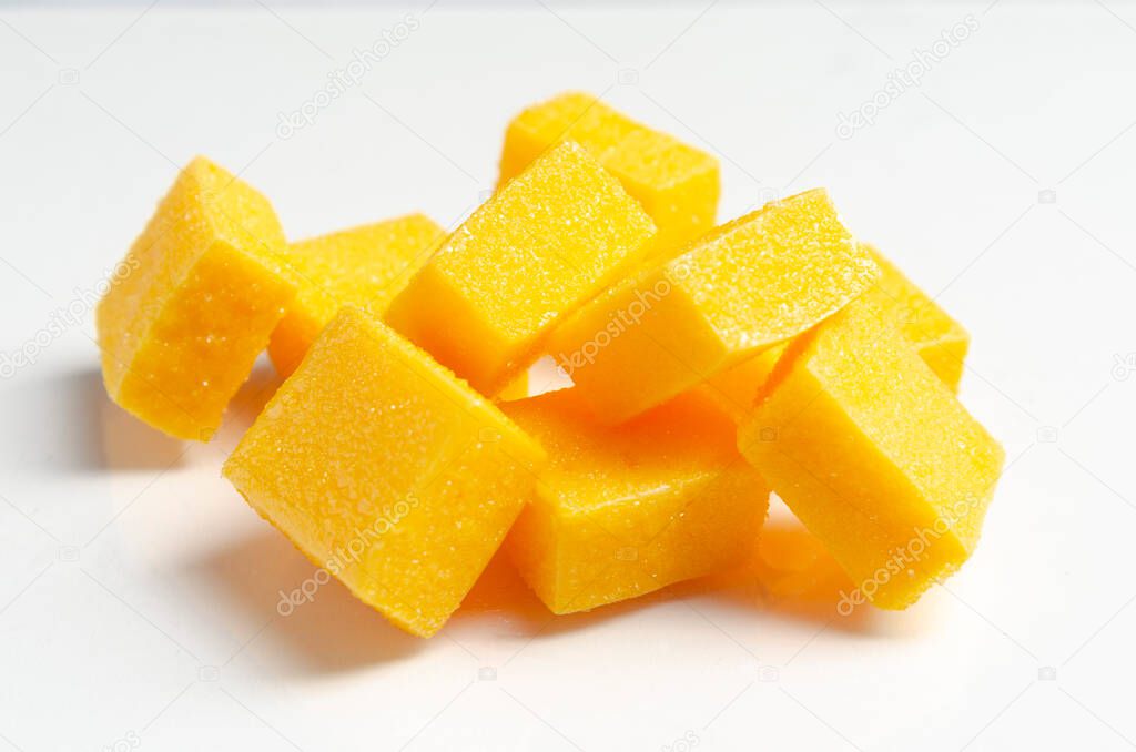 mango jelly candies on white background. Fruit candies.