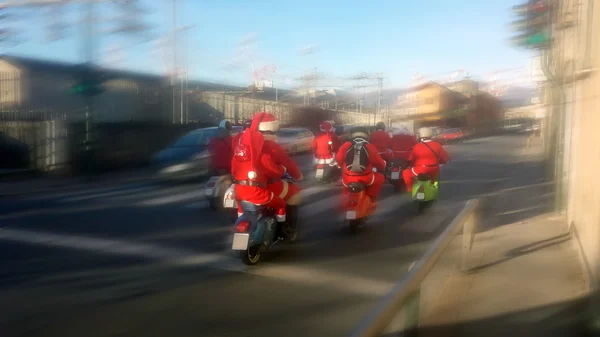 Santa Claus naik skuter — Stok Foto