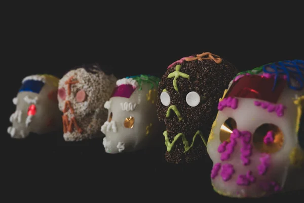 Traditional Sugar / Amaranth candy Mexican skull, Day of the Dead,  Black background, selective focus