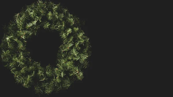 New Christmas wreath on a black background