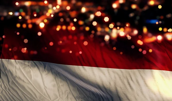 Indonézia monaco zászlaja világos éjszaka bokeh absztrakt háttér — Stock Fotó