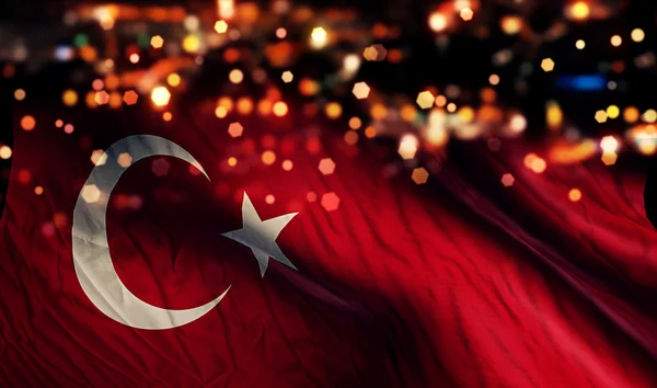 Flaga narodowa Turcja światło nocy bokeh streszczenie tło — Zdjęcie stockowe