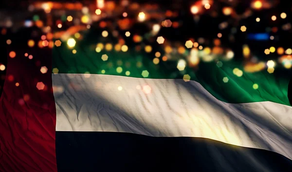 아랍 에미리트 연방 국기 빛 밤 bokeh 추상적인 배경 — 스톡 사진