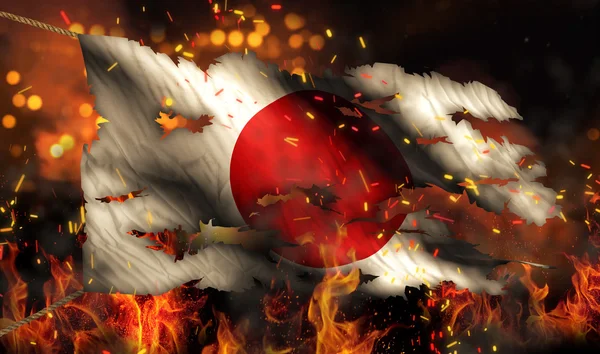 Japón Fuego ardiente Bandera Guerra Conflicto Noche 3D —  Fotos de Stock