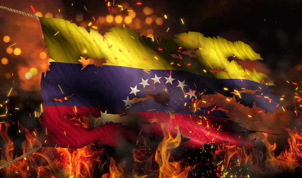Venezuela égő tűz zászlót háborús konfliktus éjszakai 3d — Stock Fotó