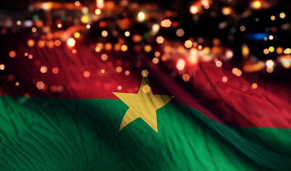 Burkina Fasos flagga ljus natt Bokeh abstrakt bakgrund — Stockfoto