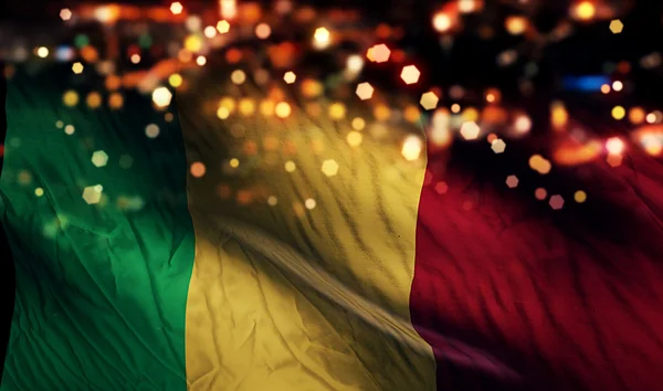 Mali nationale Flagge Licht Nacht Bokeh abstrakten Hintergrund — Stockfoto