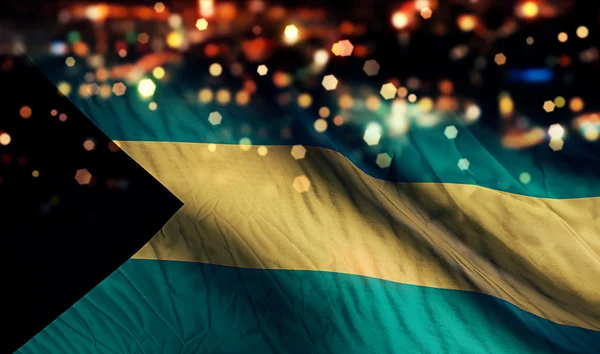 Bahamas Bandiera Nazionale Luce Notte Bokeh Sfondo astratto — Foto Stock