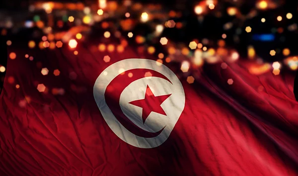 Tunesien Nationalflagge Licht Nacht Bokeh abstrakten Hintergrund — Stockfoto