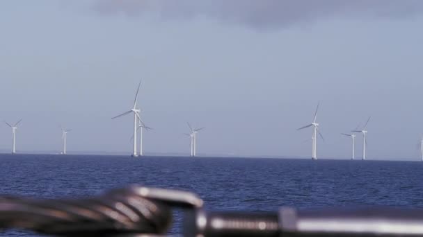 Wind turbines in the open ocean on daytime — Stock Video