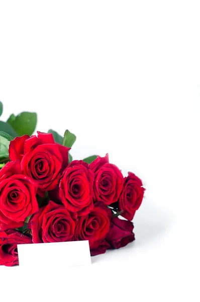 Buquê de rosas e cartão — Fotografia de Stock