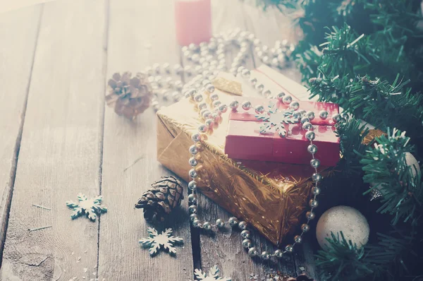 stock image Holiday Boxes with beads . Toned photo