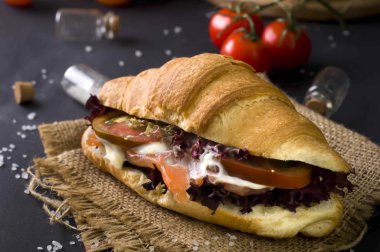 Croissant sandwich with salted salmon 