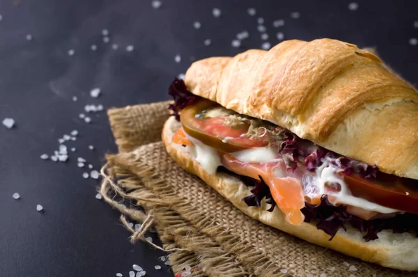 Croissant sandwich with salted salmon 