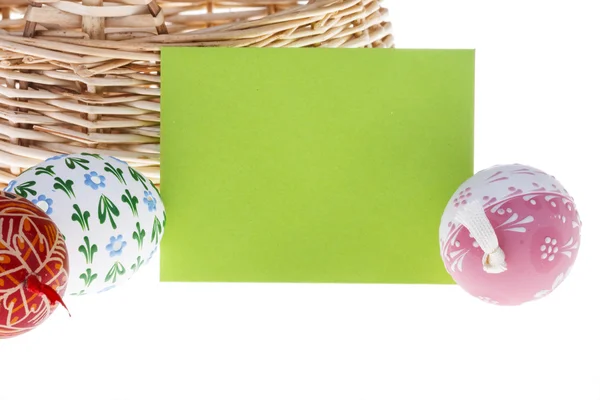 Close-up of Easter wish card and eggs — Stock Photo, Image