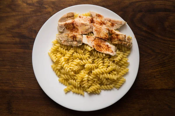 Fusilli Chicken Plate Food Wooden Table Fried Chicken Meat Spaghetti — Stock Photo, Image