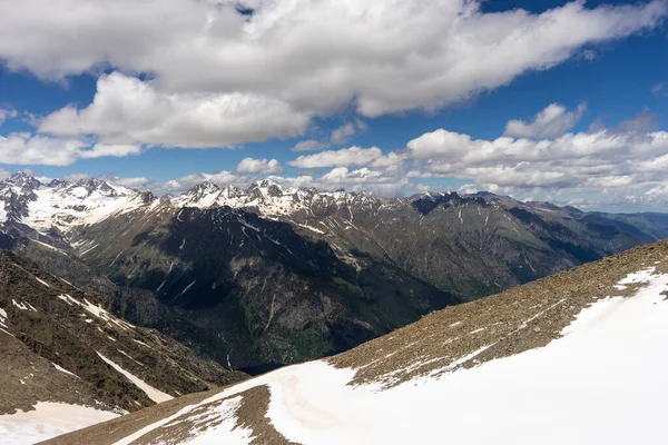 Great nature mountain landscapes. Fantastic perspective of caucasian snow inactive volcano Elbrus and clearly blue sky background. Russia