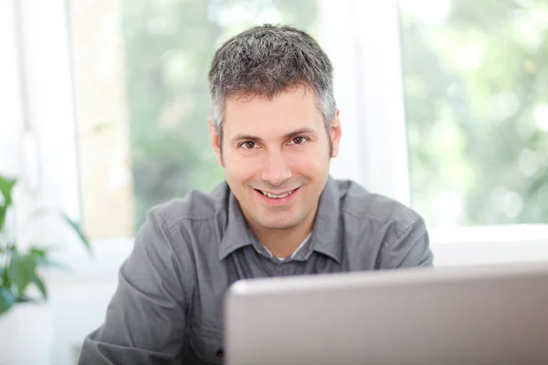 Young man at work Royalty Free Stock Photos