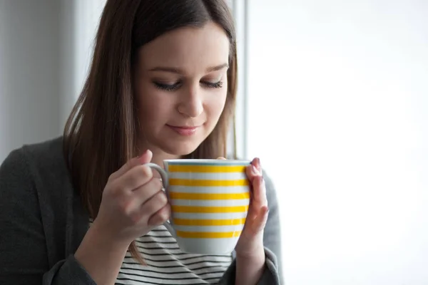 Beautiful Young Woman Standing Window Having Hot Drink —  Fotos de Stock