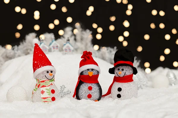 Bonecos de neve na noite de Natal — Fotografia de Stock
