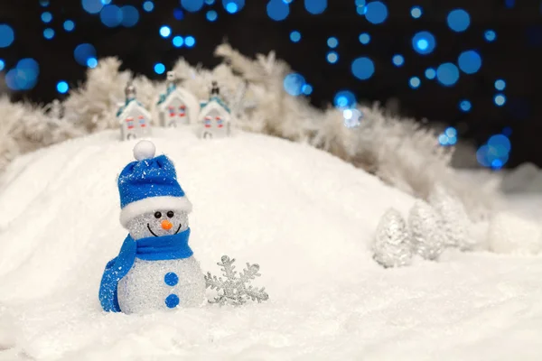 Muñeco de nieve en la noche de Navidad —  Fotos de Stock
