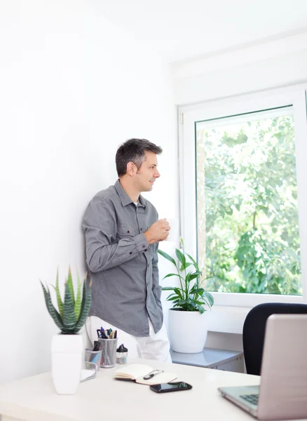 Young man at office — Stock Photo, Image