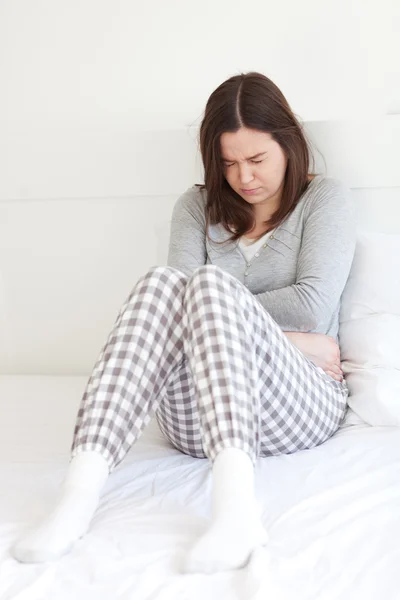 Mujer joven con dolor —  Fotos de Stock