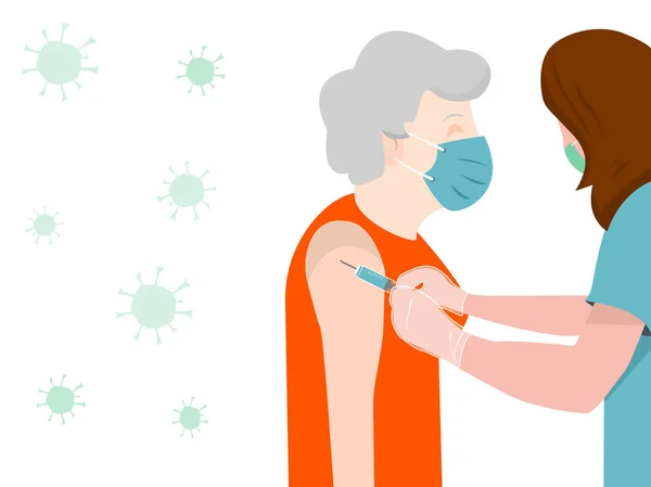 Health personnel or nurse, vaccinate an elderly woman against the coronavirus,