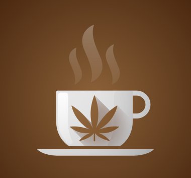 Marihuana yaprağı ile kahve fincanı