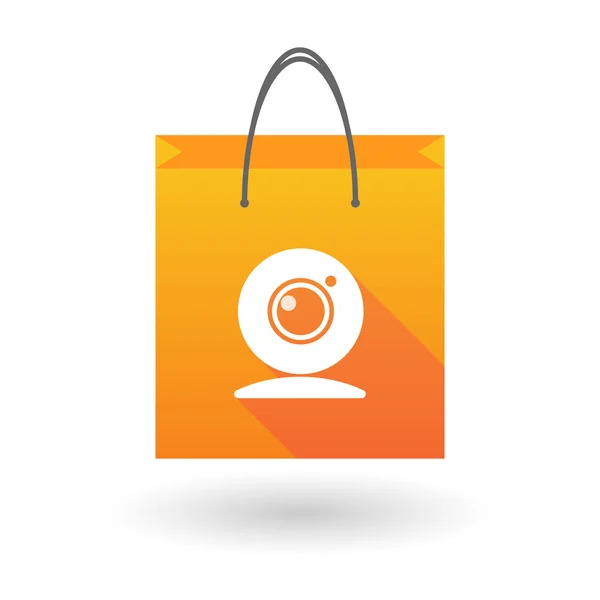 Icono de bolsa de compras con una cámara web — Vector de stock