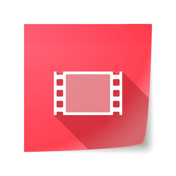 Vector de sombra largo icono de nota adhesiva con un fotograma de película — Vector de stock