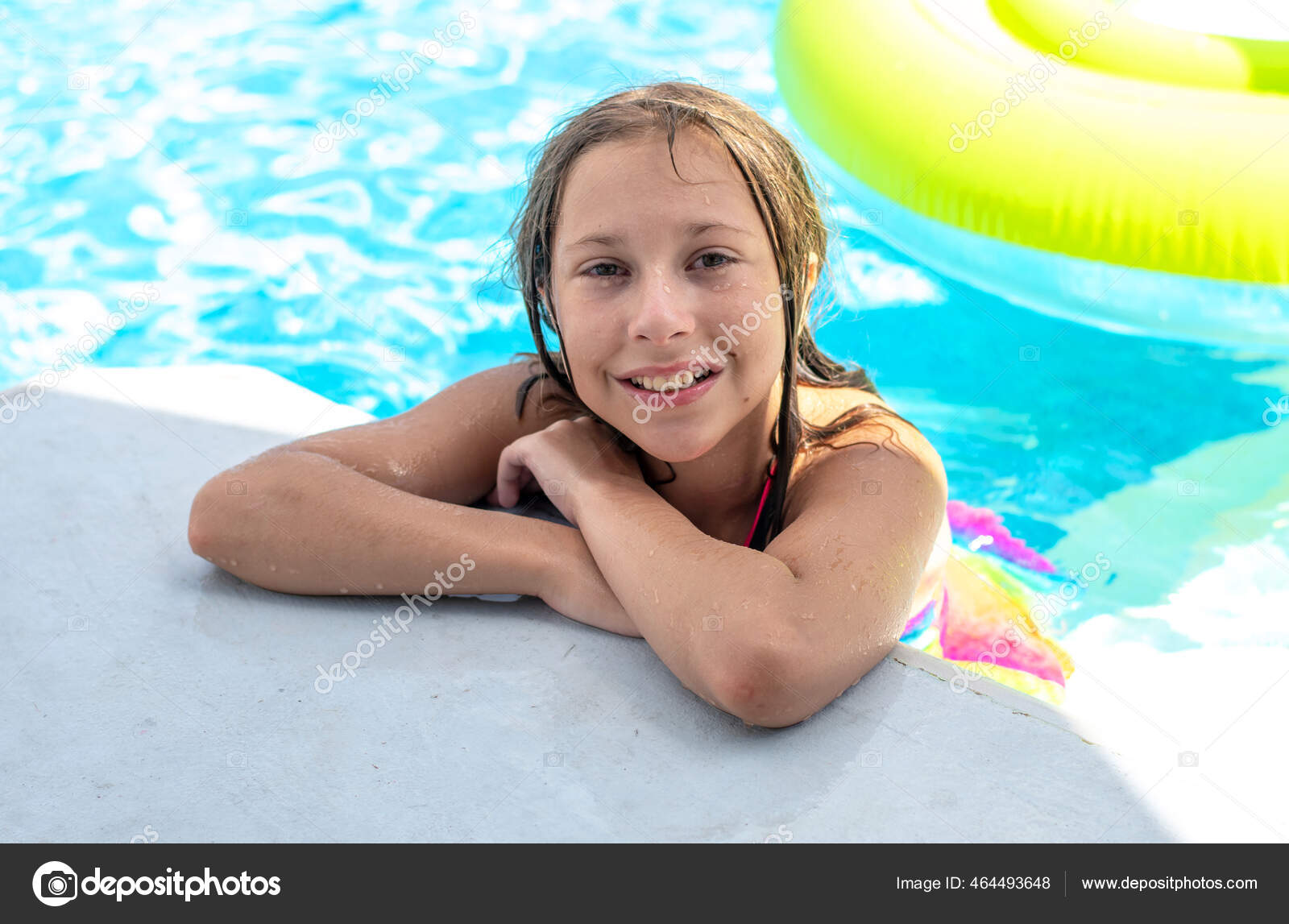 Fit Couple Posing by Pool Stock Photo - Alamy