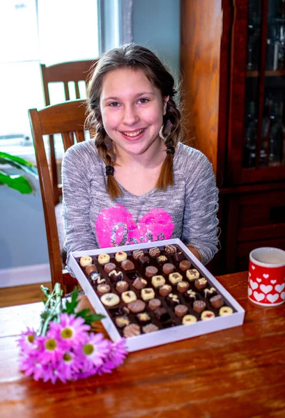 Happy Girl Shows Fancy Box Chocolates Flowers — Stock Photo, Image