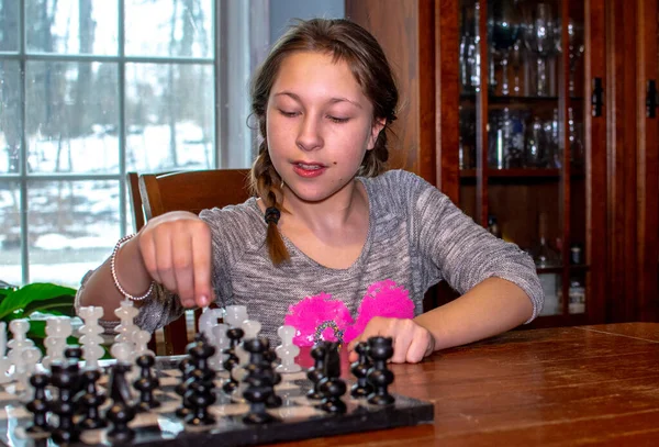 Young Girl Plays Chess Fancy Stone Chess Set — Stock Photo, Image