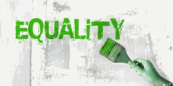 Equality word painted with paintbrush. Gender or ethnical equality concept — Stock Photo, Image