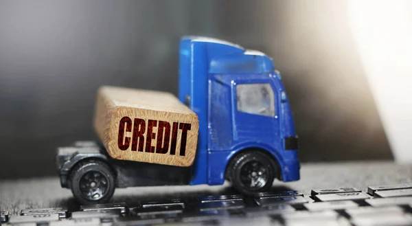 Cardboard Box Credit Word Wooden Block Mini Forklift Truck Ketboard — Stock Photo, Image