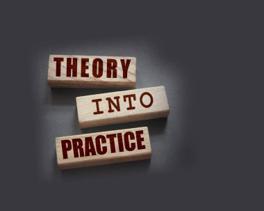 Teori, tahta bloklara yazılmış pratik sözcüklere dönüşür. Eğitim ya da iş kurma kavramı.