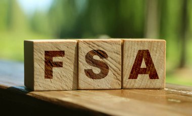 Tahta küplere yazılmış esnek harcama hesabı FSA. Mali konsept