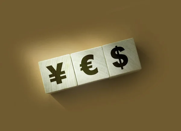 World Currencies Symbols Yen Euro Dollar Printed Wooden Cubes Currency — Stock Photo, Image