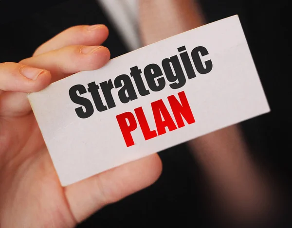 Strategic plan on catf in businessman had. Business plan concept.