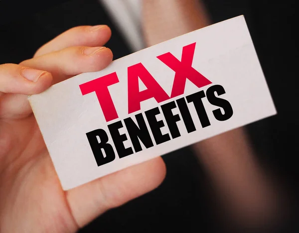 Businessman Shows Card Text Tax Benefits Taxes Fees Policy Regulation — Stock Photo, Image