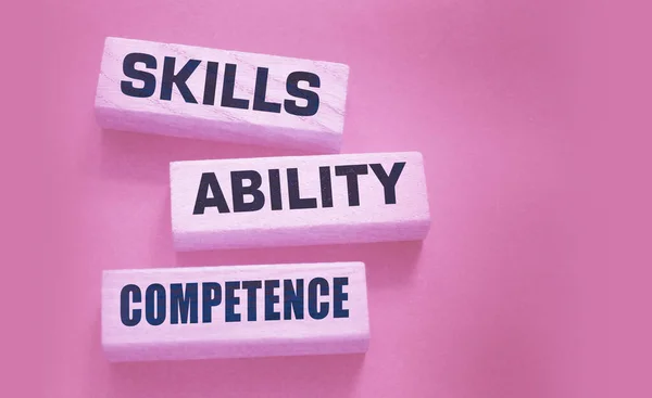 Skills ability competence words in wooden blocks concept. Career and business success concept.